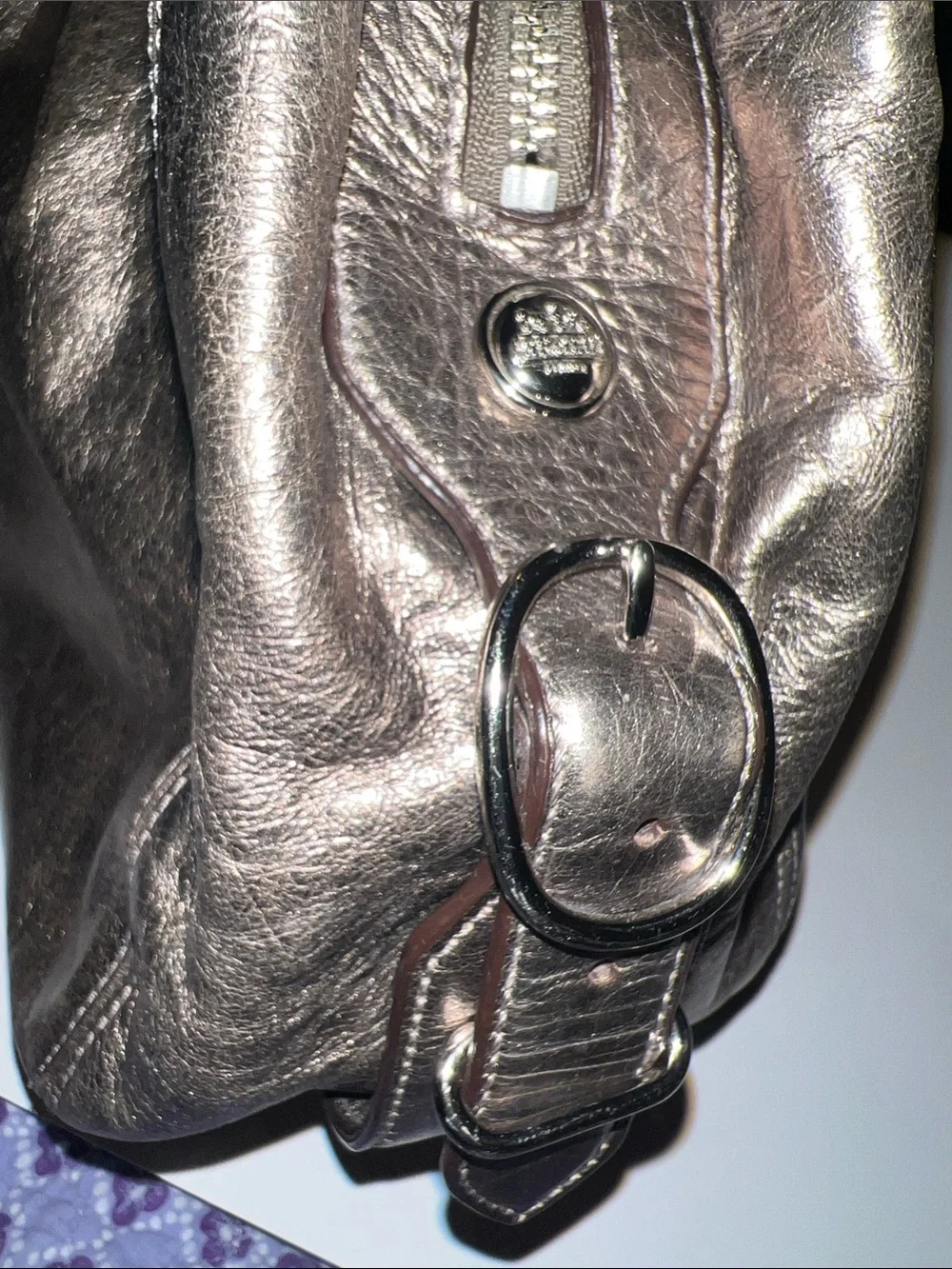 Coach Madison Maggie hobo shoulder bag featuring a metallic gunmetal leather